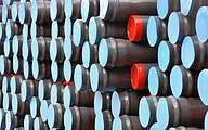 Stock grey plastic pipes with red and blue caps